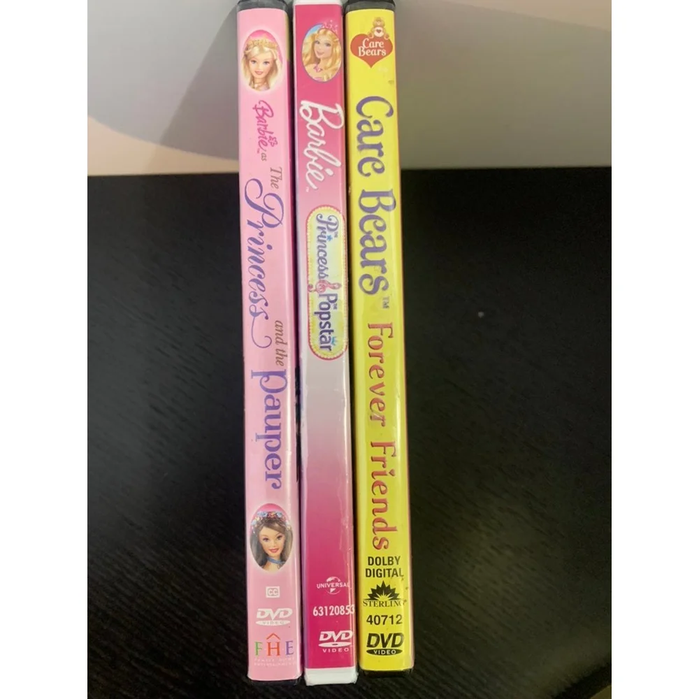 Lot of Barbie and Care Bears Movies